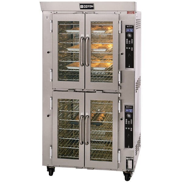 A large Doyon double deck bakery convection oven with food inside.