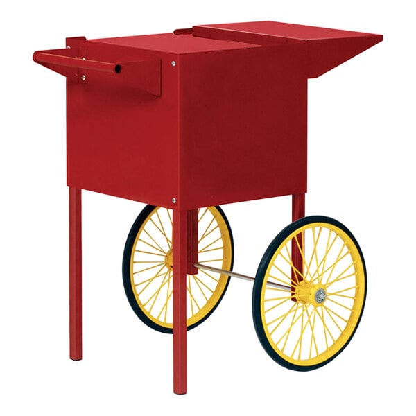 A red and yellow Paragon popcorn cart with wheels.