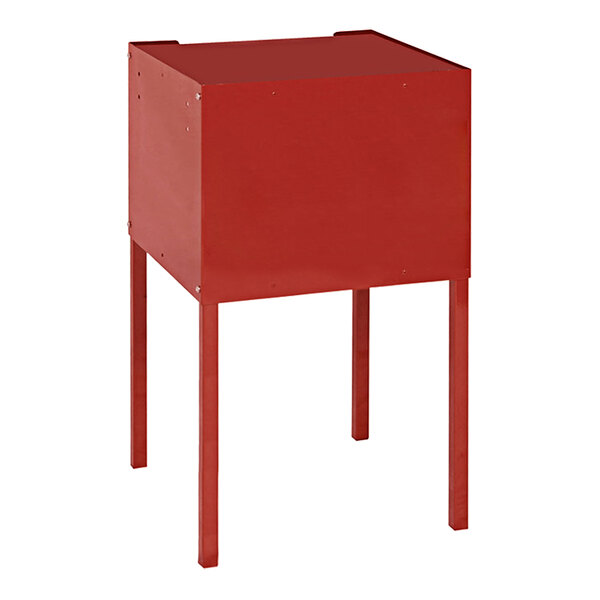 A red metal box on a stand with legs.