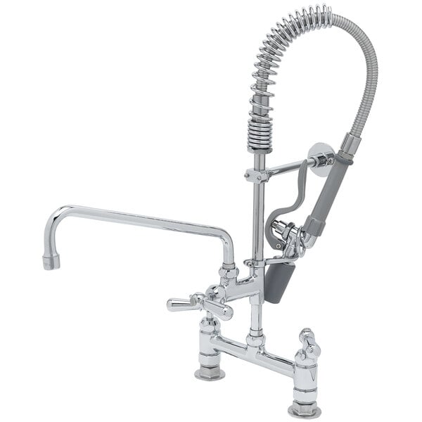 A chrome T&S mini pre-rinse faucet with club handles and a hose.