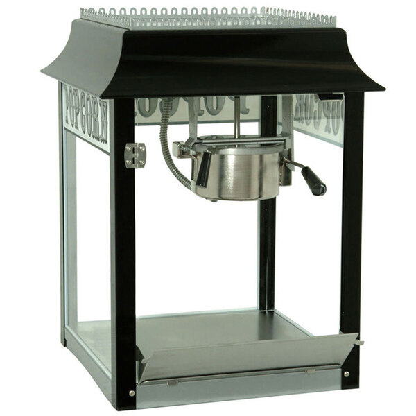 A black and silver Paragon 1911 Original Popcorn Machine with a glass top.