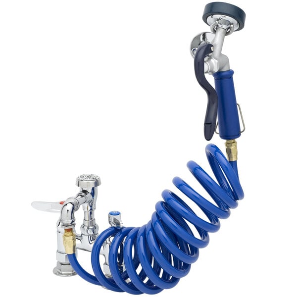 A close-up of a blue coiled hose attached to a faucet.