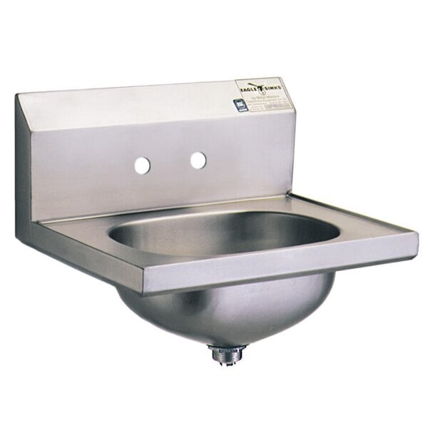A stainless steel Eagle Group hand sink with faucet holes and a basket drain.