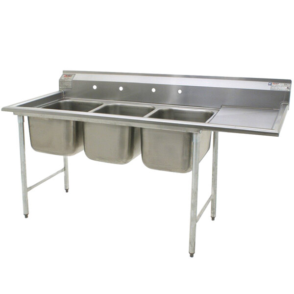 A stainless steel Eagle Group three compartment sink with a right drainboard.