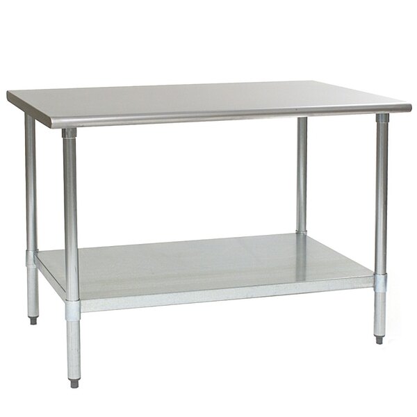 A stainless steel Eagle Group work table with galvanized undershelf.