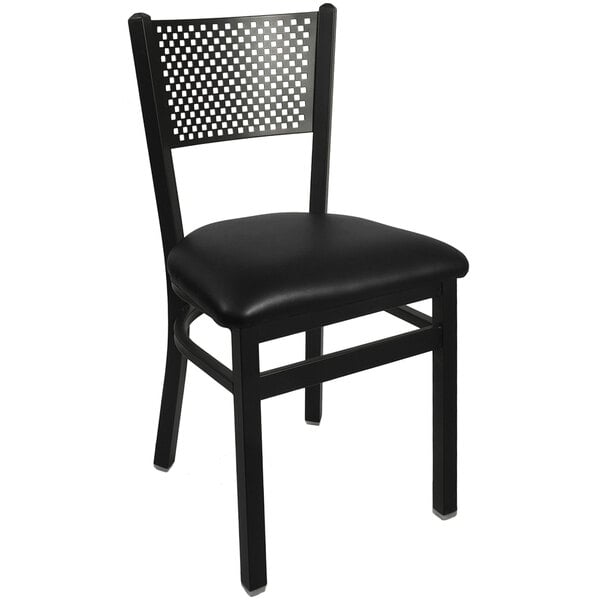 A BFM Seating black steel side chair with a black vinyl seat.