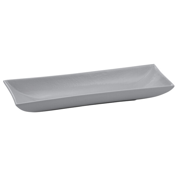 A natural cast aluminum rectangular platter with a flared edge.