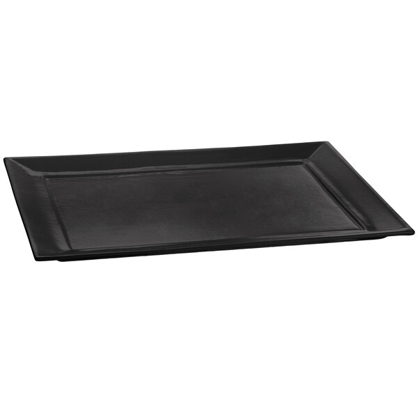 A black rectangular Tablecraft cast aluminum platter with handles.