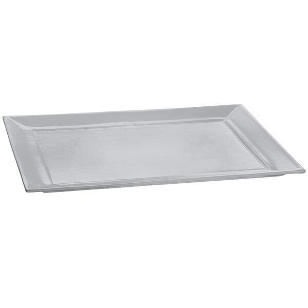 A natural cast aluminum rectangular platter with a rectangle shape.