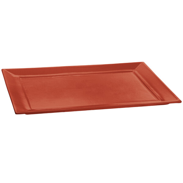 A red rectangular Tablecraft copper tray.