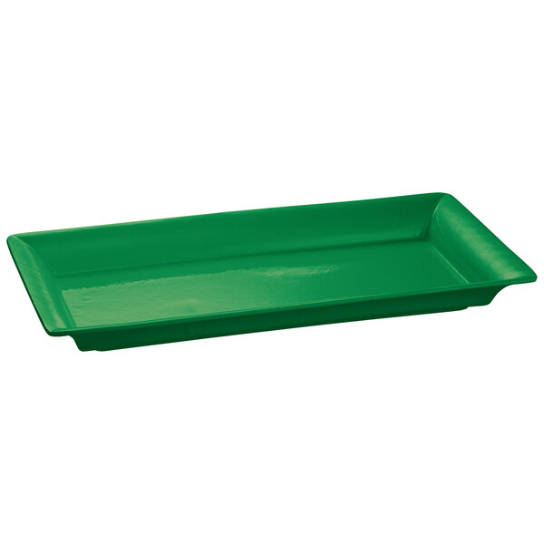 A green rectangular cast aluminum tray with handles.