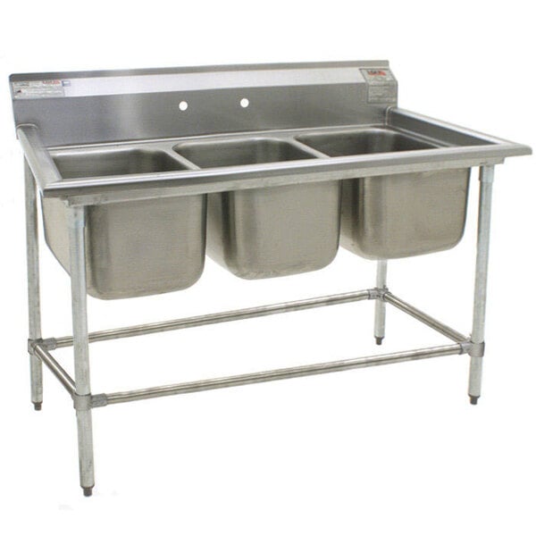 A close-up of an Eagle Group stainless steel 3 compartment sink with three bowls.