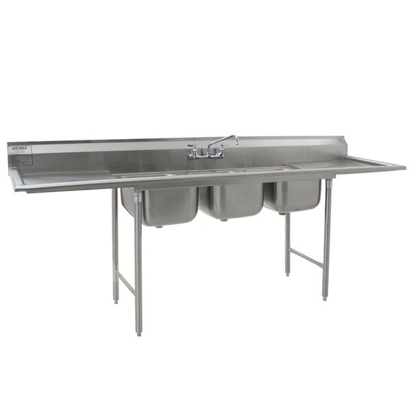 A stainless steel Eagle Group commercial 3 compartment sink with two 18" drainboards.