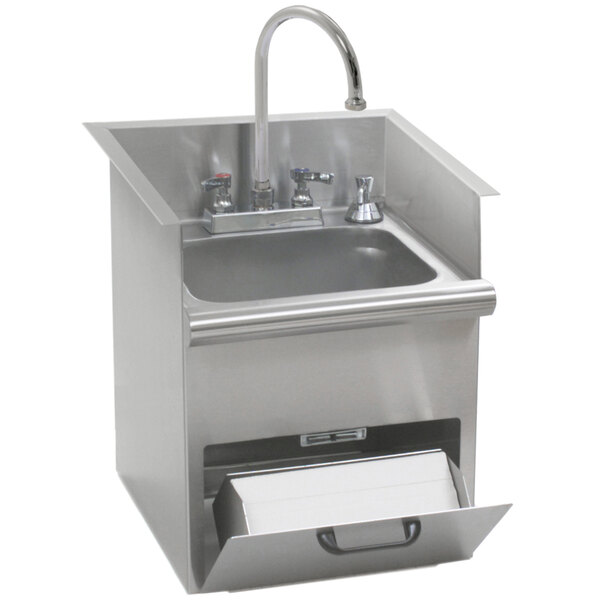 A stainless steel Eagle Group hand wash sink with built-in towel and soap dispensers.