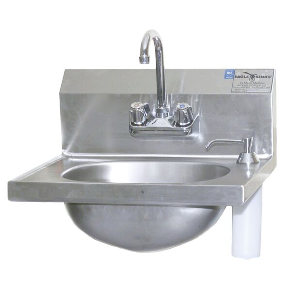 A stainless steel Eagle Group hand sink with faucet and drain on a counter.