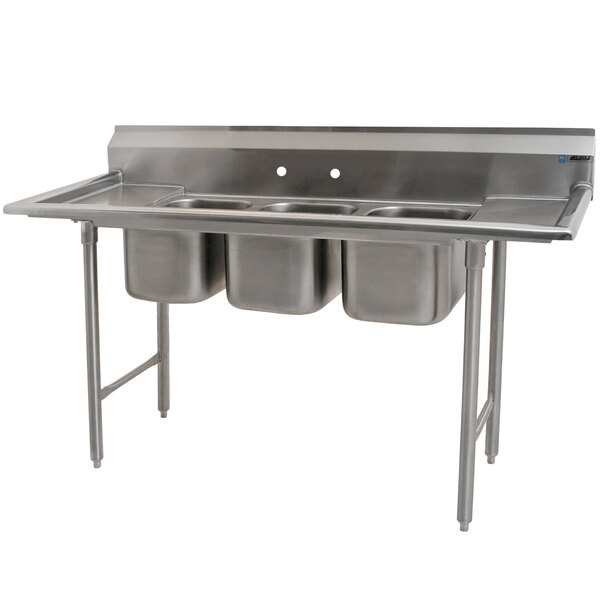 A stainless steel Eagle Group three compartment sink with two drainboards.