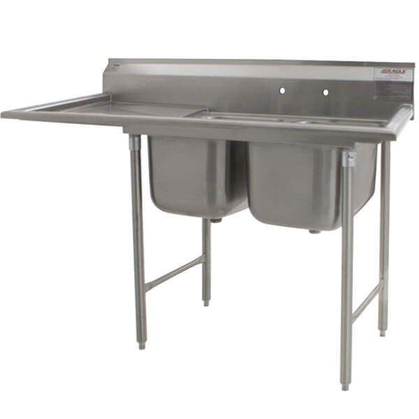 A stainless steel Eagle Group 2-bowl sink with left drainboard.