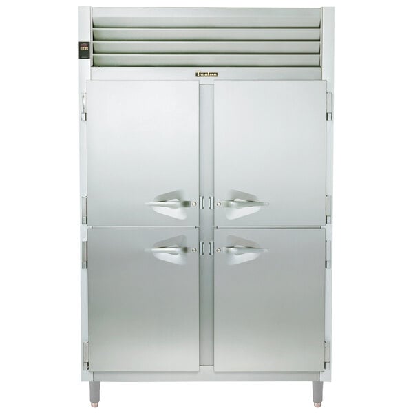 A stainless steel Traulsen pass-through refrigerator with two doors.