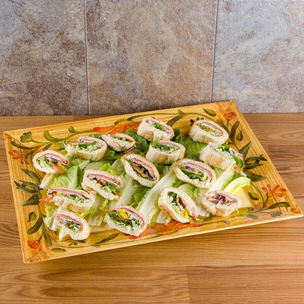 A Venetian tray with sandwiches on it.