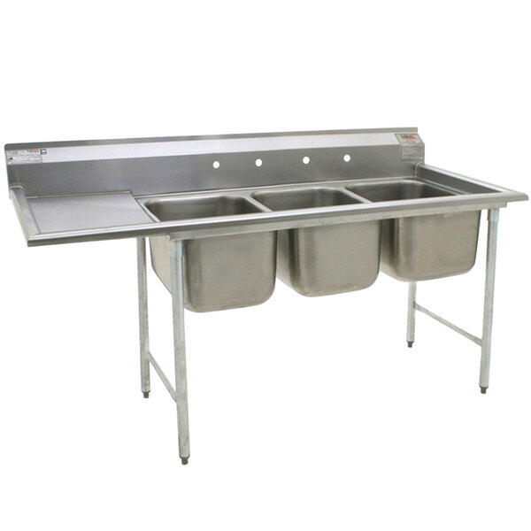 A stainless steel Eagle Group three compartment sink with two bowls and a left drainboard.