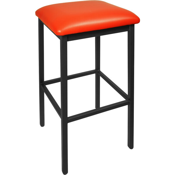 A black BFM Seating bar stool with a red vinyl seat.