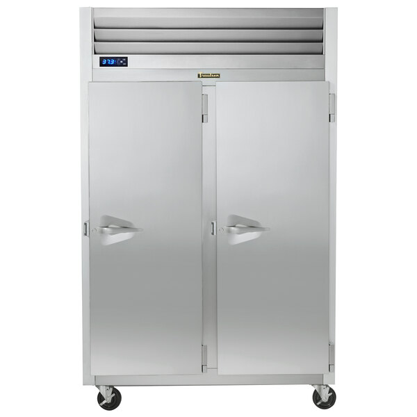 A Traulsen reach-in refrigerator with two solid doors.