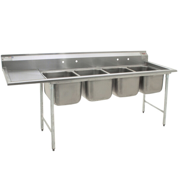 A stainless steel Eagle Group four compartment sink with a left drainboard.