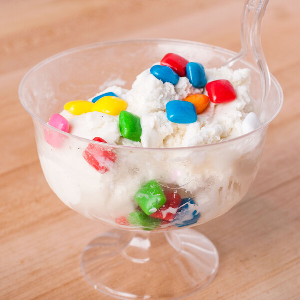 A bowl of Dutch Treat Bubble Gum Bits candy ice cream topping on a bowl of ice cream.