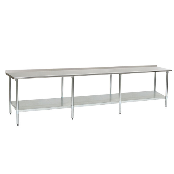 A long Eagle Group stainless steel work table with undershelf and backsplash.