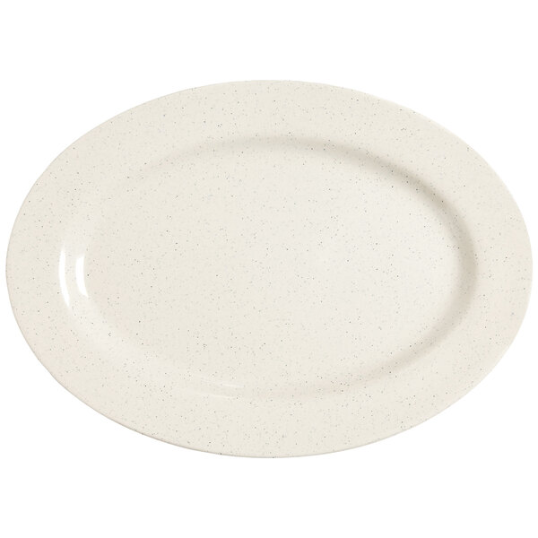 A white oval platter with speckled specks.