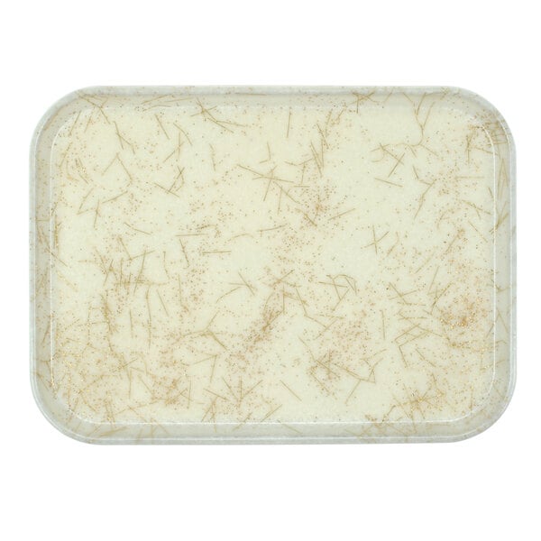 A white rectangular Cambro tray with brown speckles.