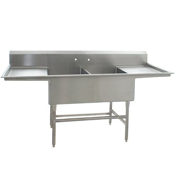 A stainless steel Eagle Group commercial compartment sink with two bowls and two 30" drainboards.