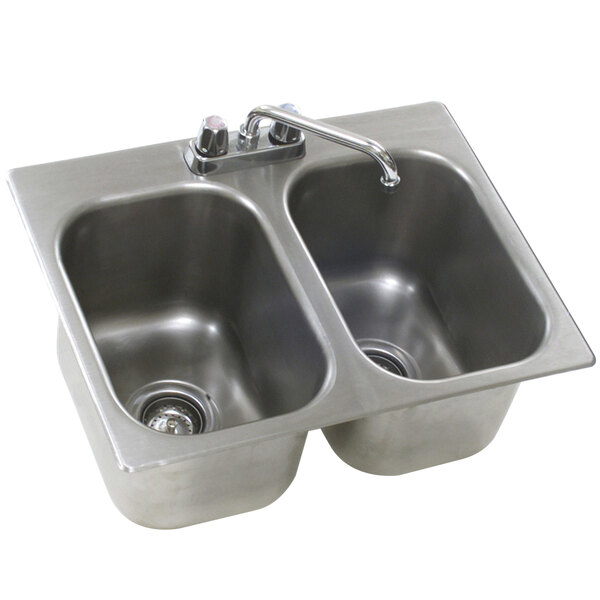 A stainless steel Eagle Group double sink with deck mount faucets.