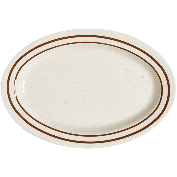 An ironstone oval platter with brown lines on the rim.
