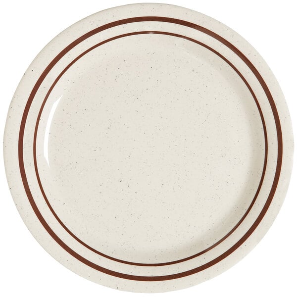 A white plate with a brown line.