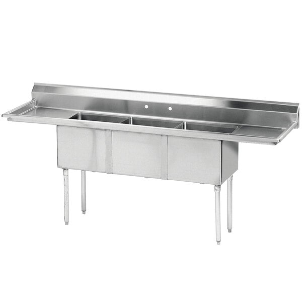 A stainless steel Advance Tabco three compartment sink with two drainboards.