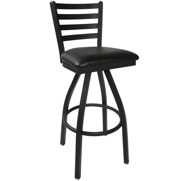 A BFM Seating black steel bar stool with a black vinyl seat.