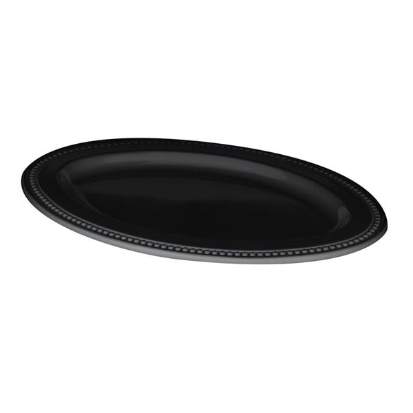 A black oval melamine platter with a beaded edge.