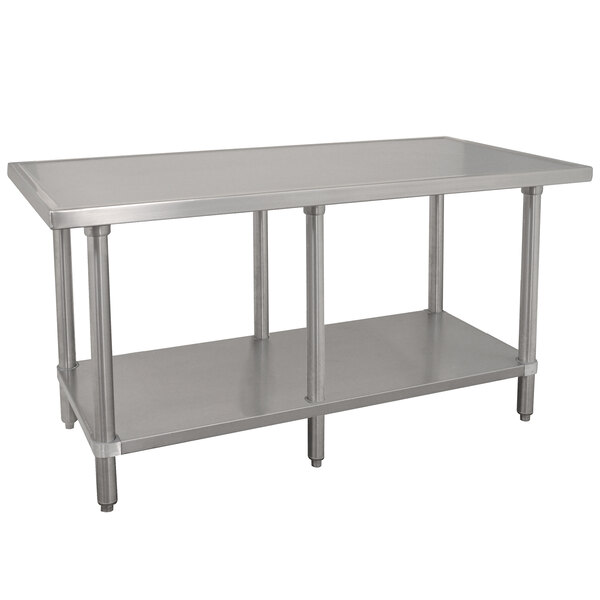 A stainless steel Advance Tabco work table with a stainless steel undershelf.