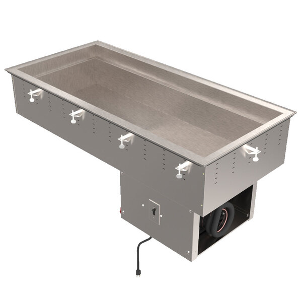 A Vollrath stainless steel rectangular remote drop-in refrigerated cold food well with knobs on a counter.