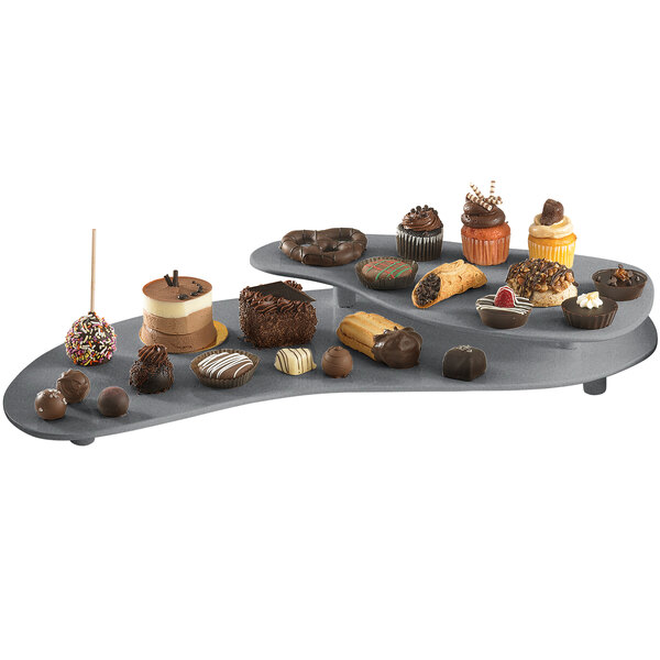 A Tablecraft granite cast aluminum two tiered platter with pastries on it.