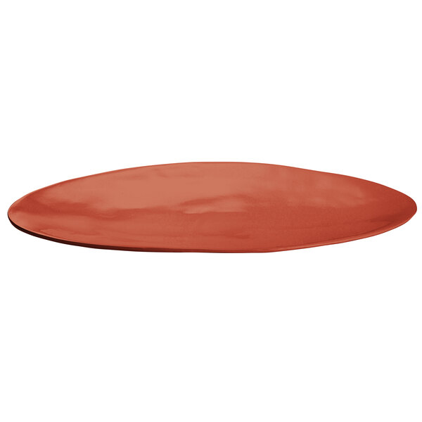 A Tablecraft copper cast aluminum oblong platter with a red rim.