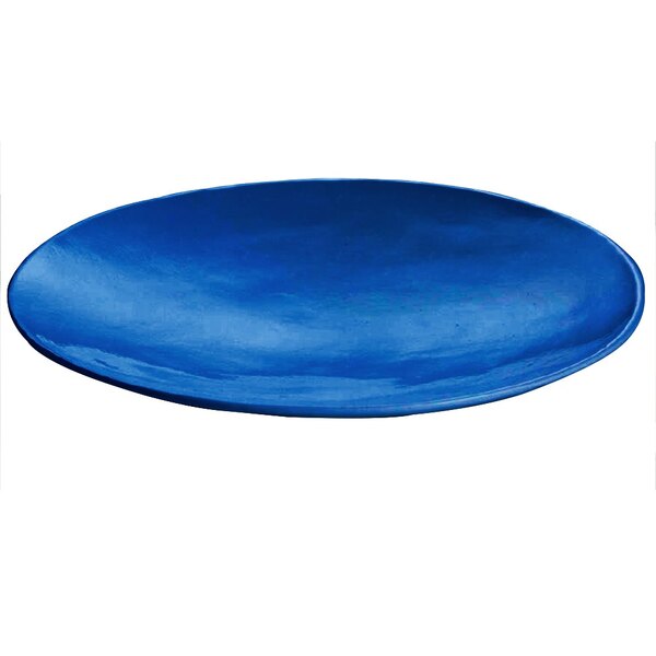 A cobalt blue cast aluminum round flared platter on a white background.