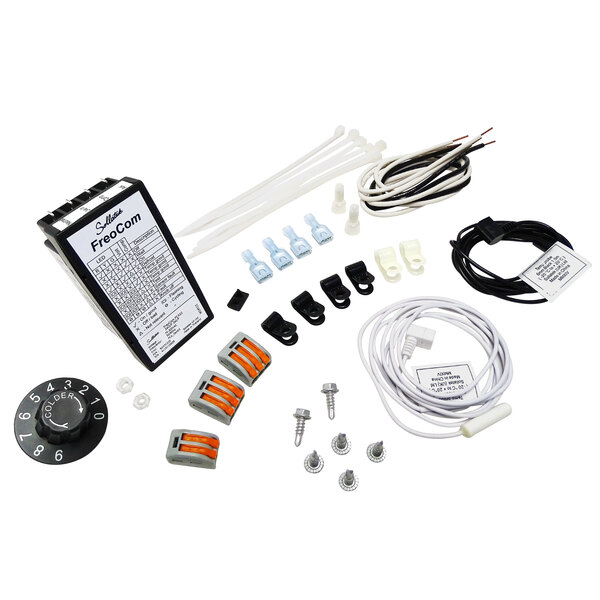 A True Electronic Temperature Control Retrofit kit with electrical equipment and a black and white dial.
