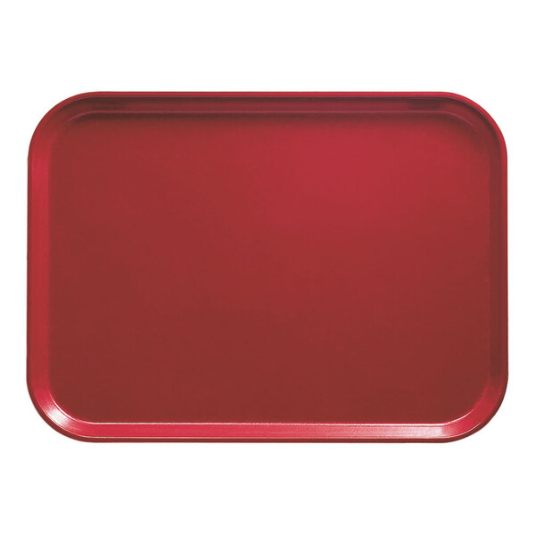 A red rectangular Cambro fiberglass tray on a white counter.