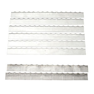 A Nemco replacement blade kit with four metal strips with different shapes.