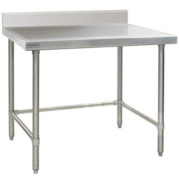 A stainless steel Eagle Group work table with a white surface.
