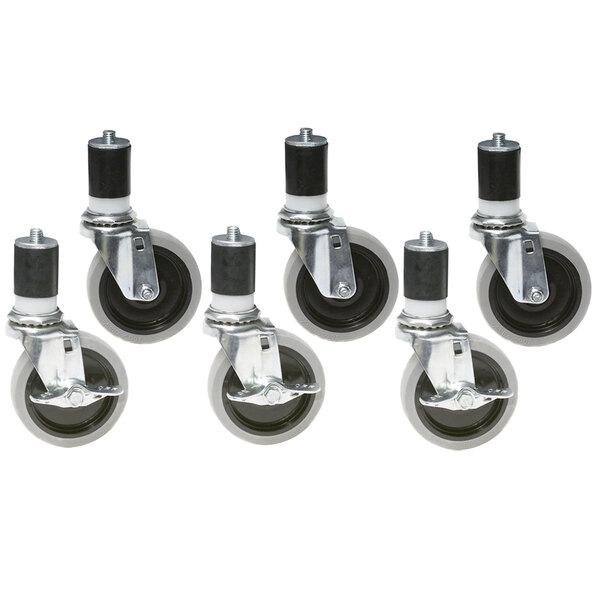 A set of four black and white polymer casters with rubber wheels.