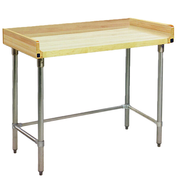 A wooden Eagle Group work table with a galvanized metal base.