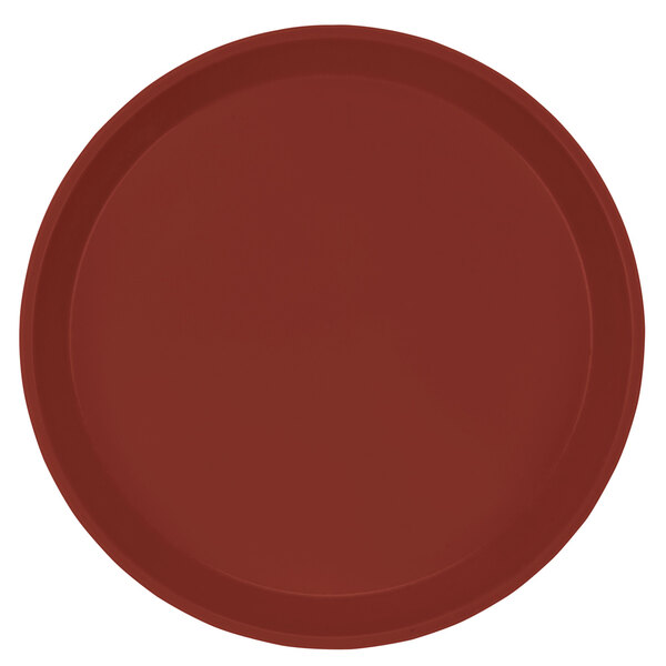 A red round fiberglass tray with a white background.